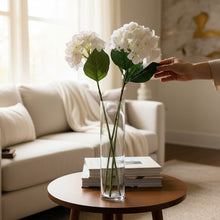 Load image into Gallery viewer, Field & Rose Eco White Hydrangea Stem, 69cm, crafted from recycled fabric and plastic, with green leaves.