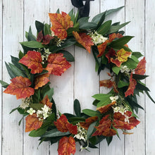 Load image into Gallery viewer, Autumn Wreath Rich russet maple leaves and lush green laurel, sprinkled with wild hydrangeas are stunning on this beautiful Autumn wreath. Looks gorgeous on both light and dark coloured doors. Bring a a touch of Autumn colour to your front door this season. This everlasting wreath can be enjoyed year after year.